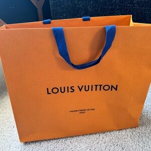 Louis Vuitton Vibrant Orange Bag with Blue Handles